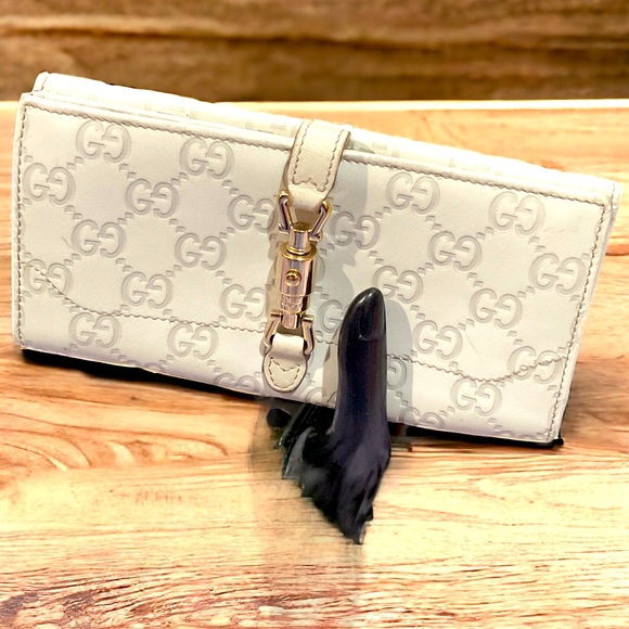 Gucci Handbags - Authentic Gucci Cream and Gold Jackie GG Long Wallet With Dust Bag